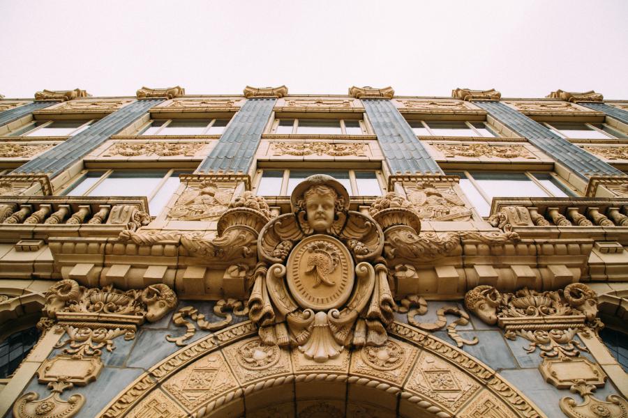 An ornately decorated building in Uptown, Chicago. The title is inspired by a quote from Lynn Becker at the Chicago Reader:r "a riotous, Spanish-baroque-inspired hallucination"